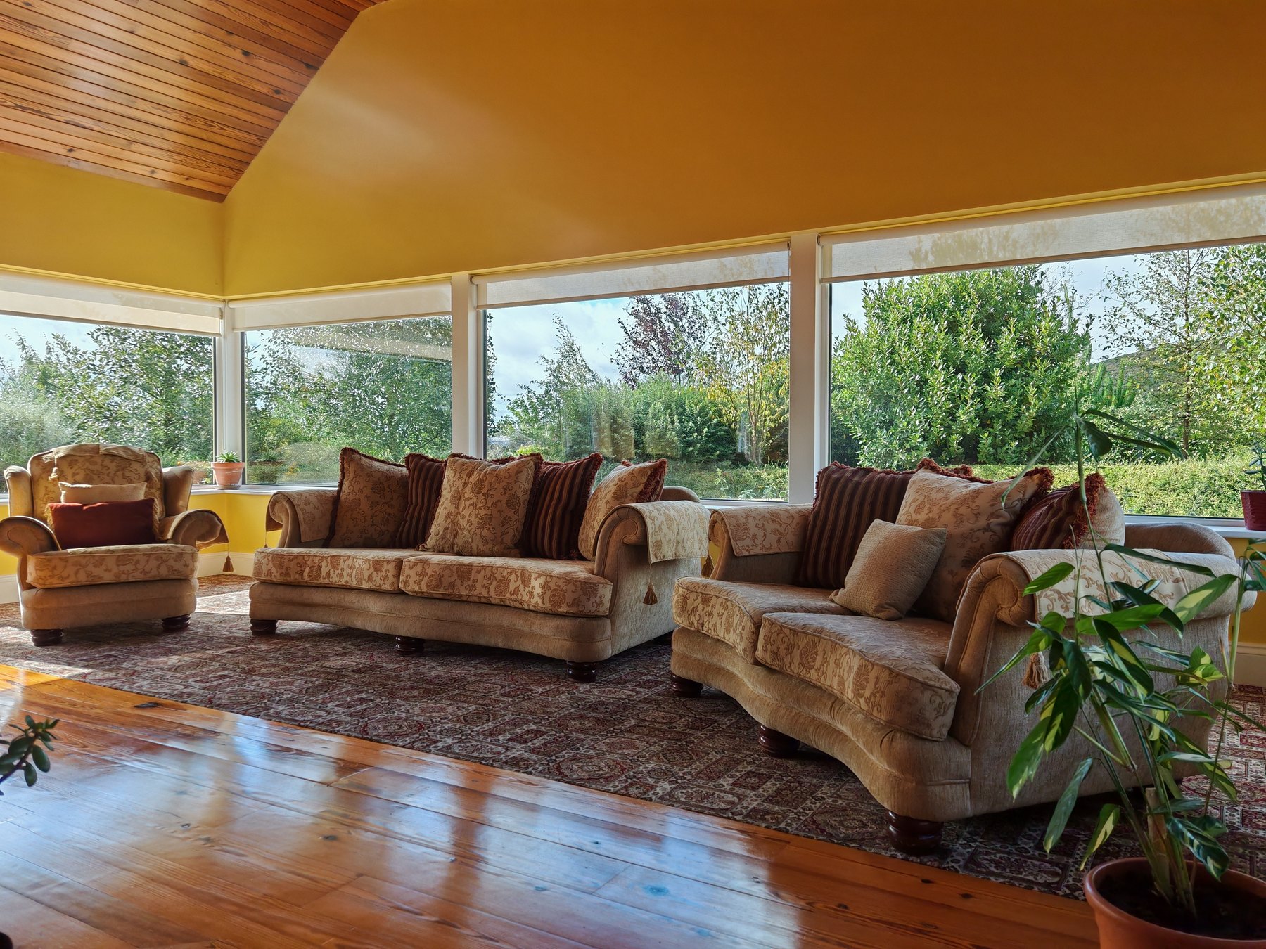The bright shared sun room at Yellow Rock Sanctuary